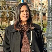 An English teacher currently educating students in India by creating a casual environment.
